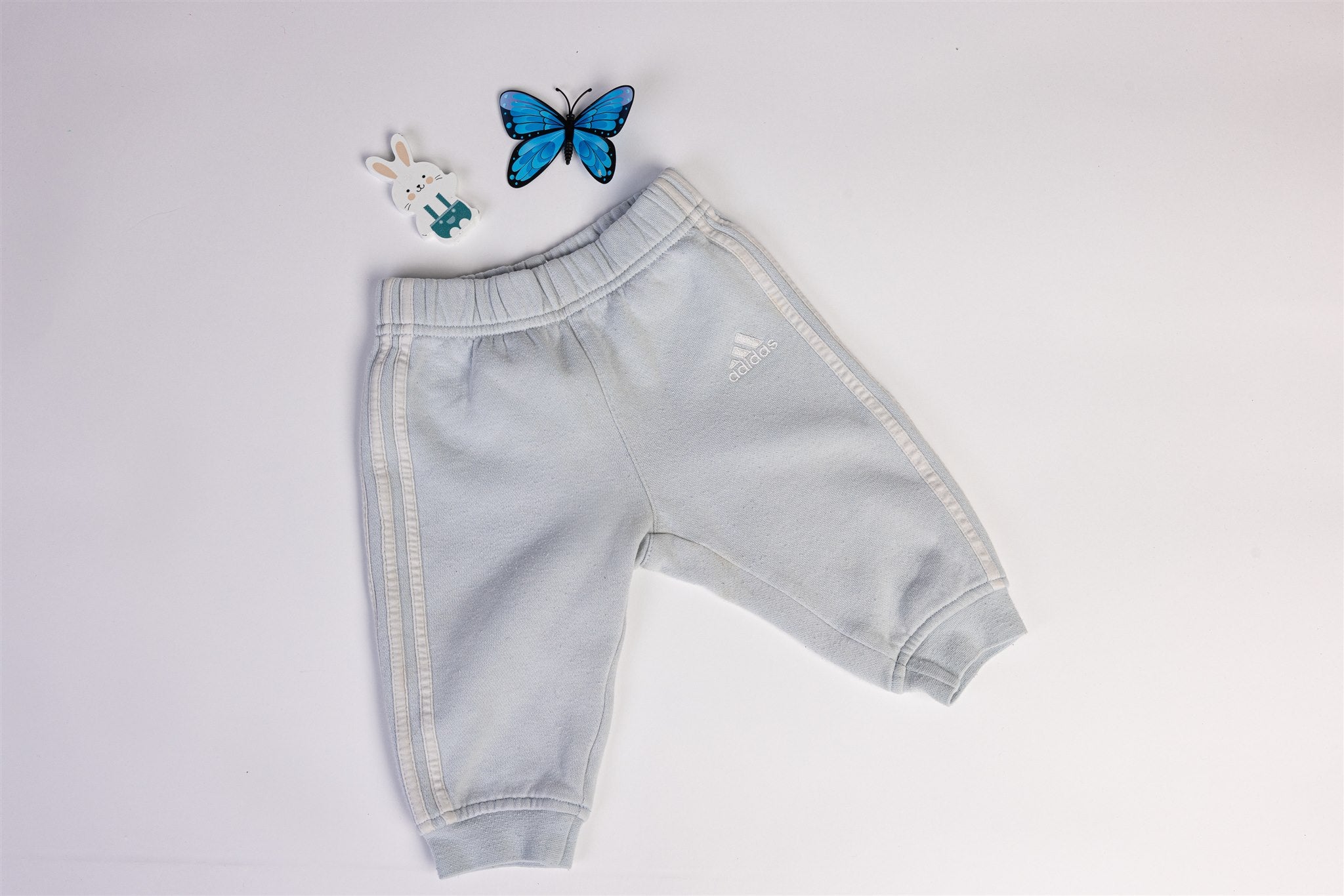 Pale blue Adidas trousers