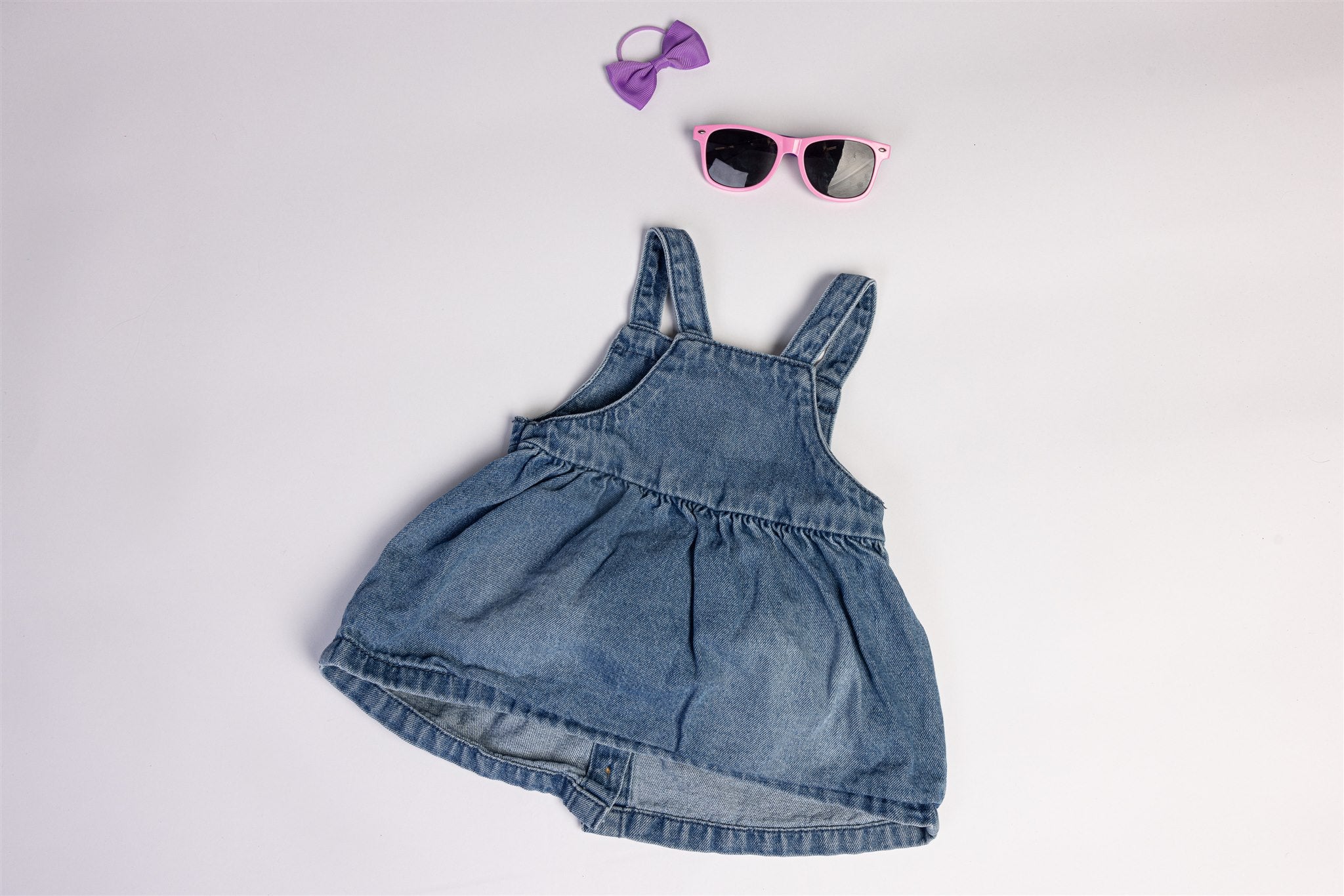 Denim pinafore dress with bunny pockets