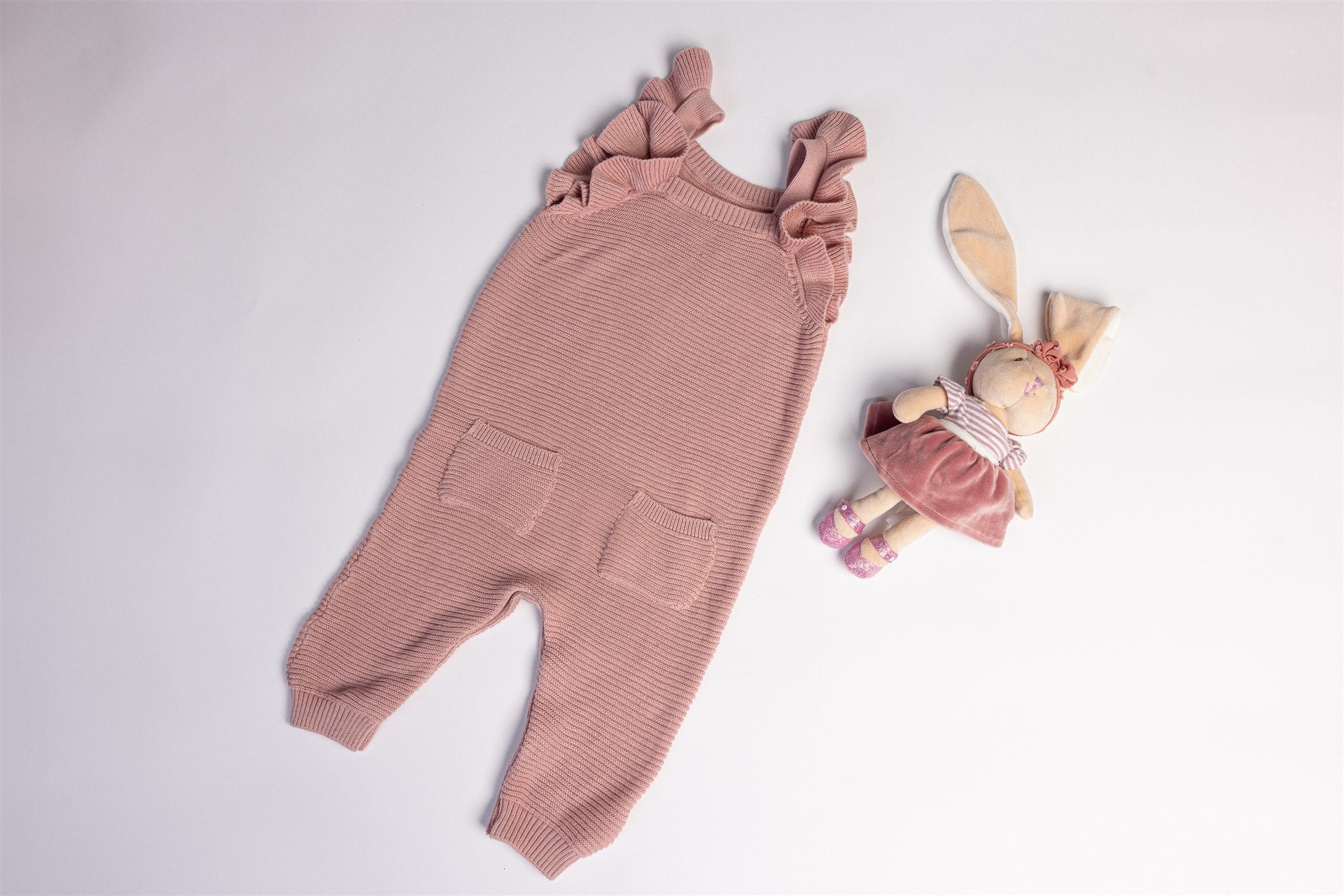 Knitted frill dungarees in dusty pink