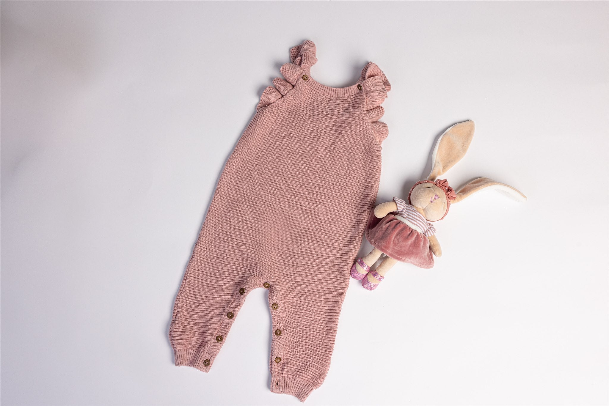 Knitted frill dungarees in dusty pink