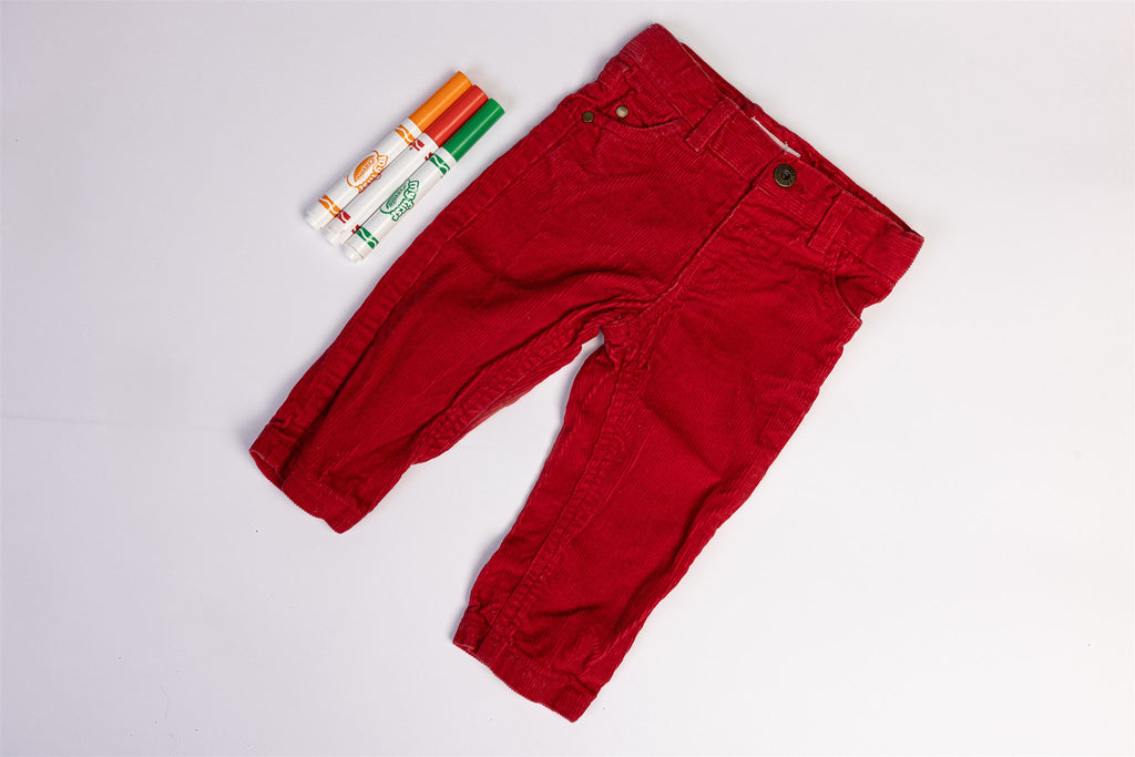 Bright red corduroy effect trousers
