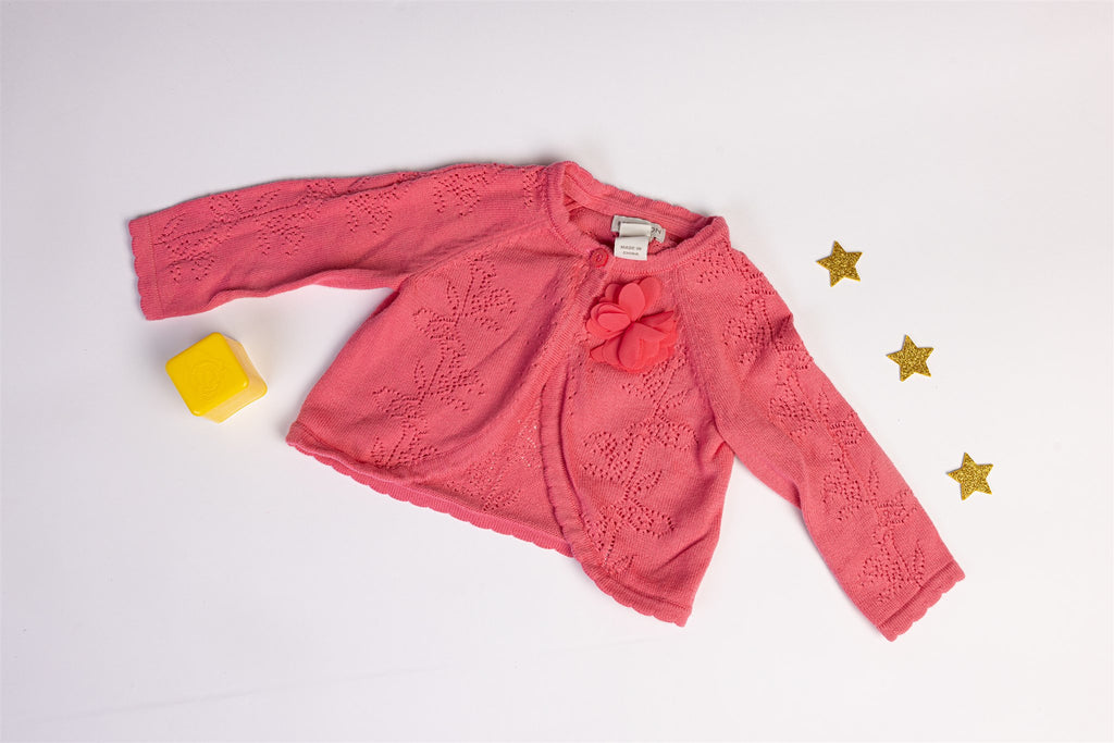 Pink knitted cardigan with floral detail