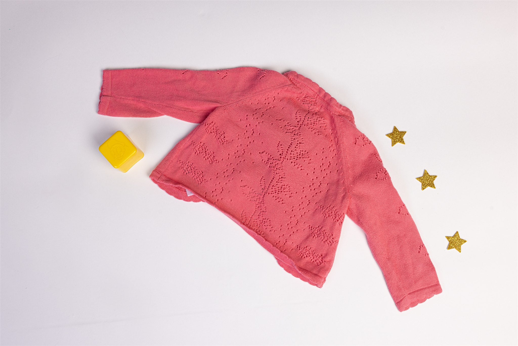 Pink knitted cardigan with floral detail