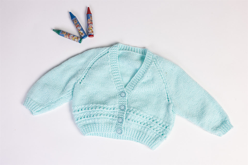 Handmade light blue knitted cardigan