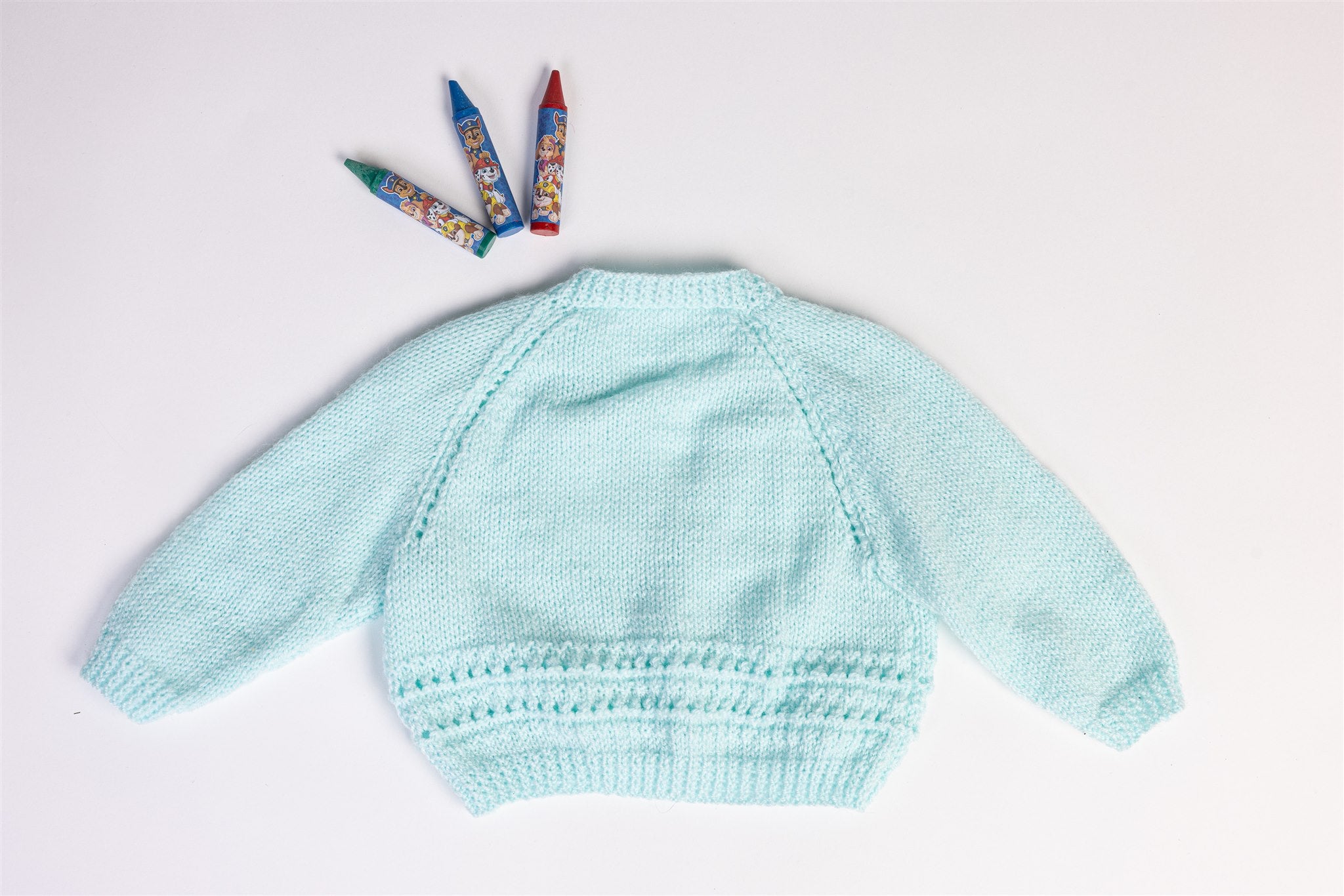 Handmade light blue knitted cardigan