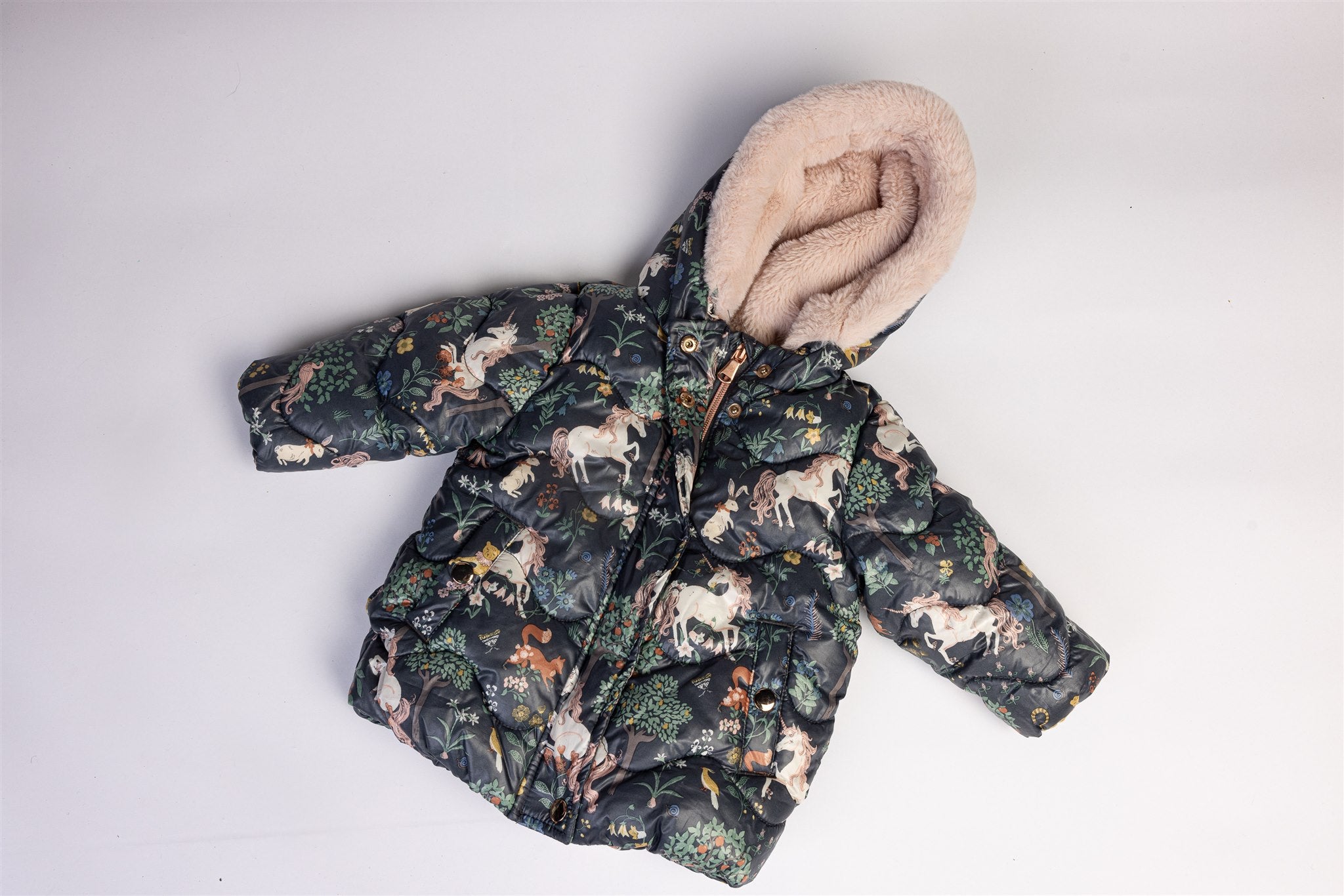 Coat with unicorns and forest print