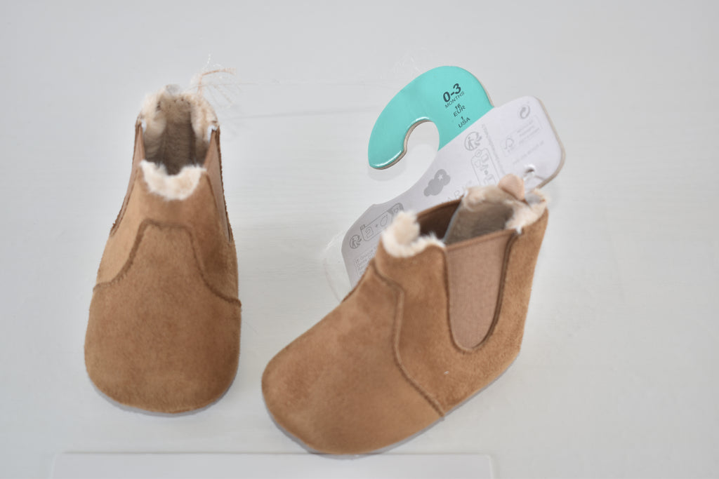 New with tags faux suede fleece-lined ankle boots