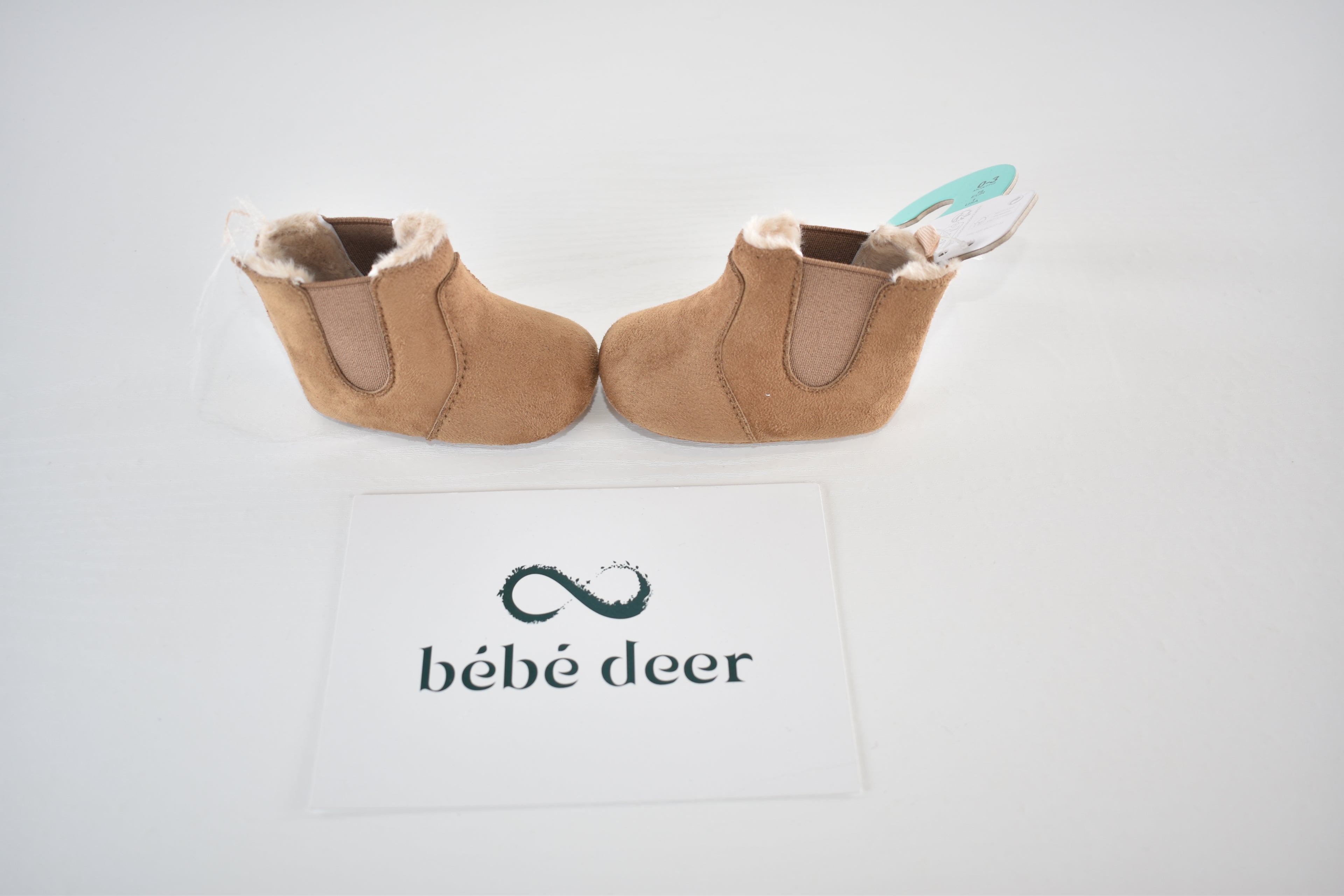 New with tags faux suede fleece-lined ankle boots