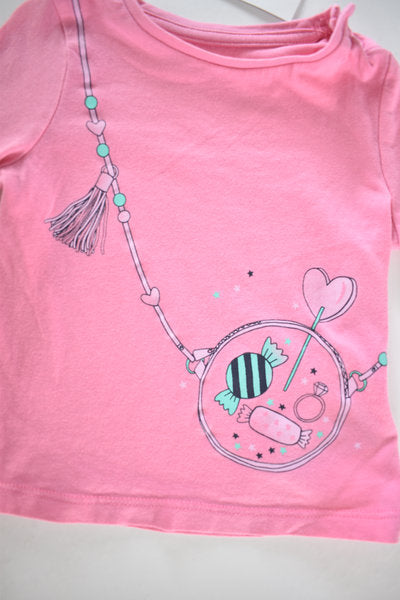 Pink top with sweets and heart design