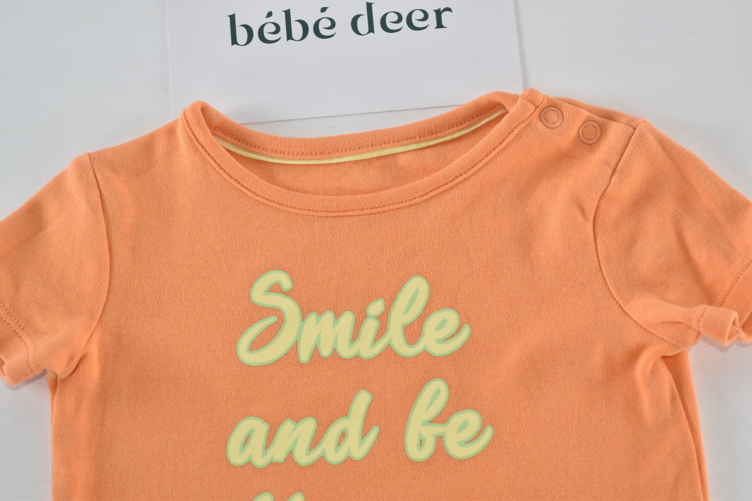 "Smile and Be Happy" top