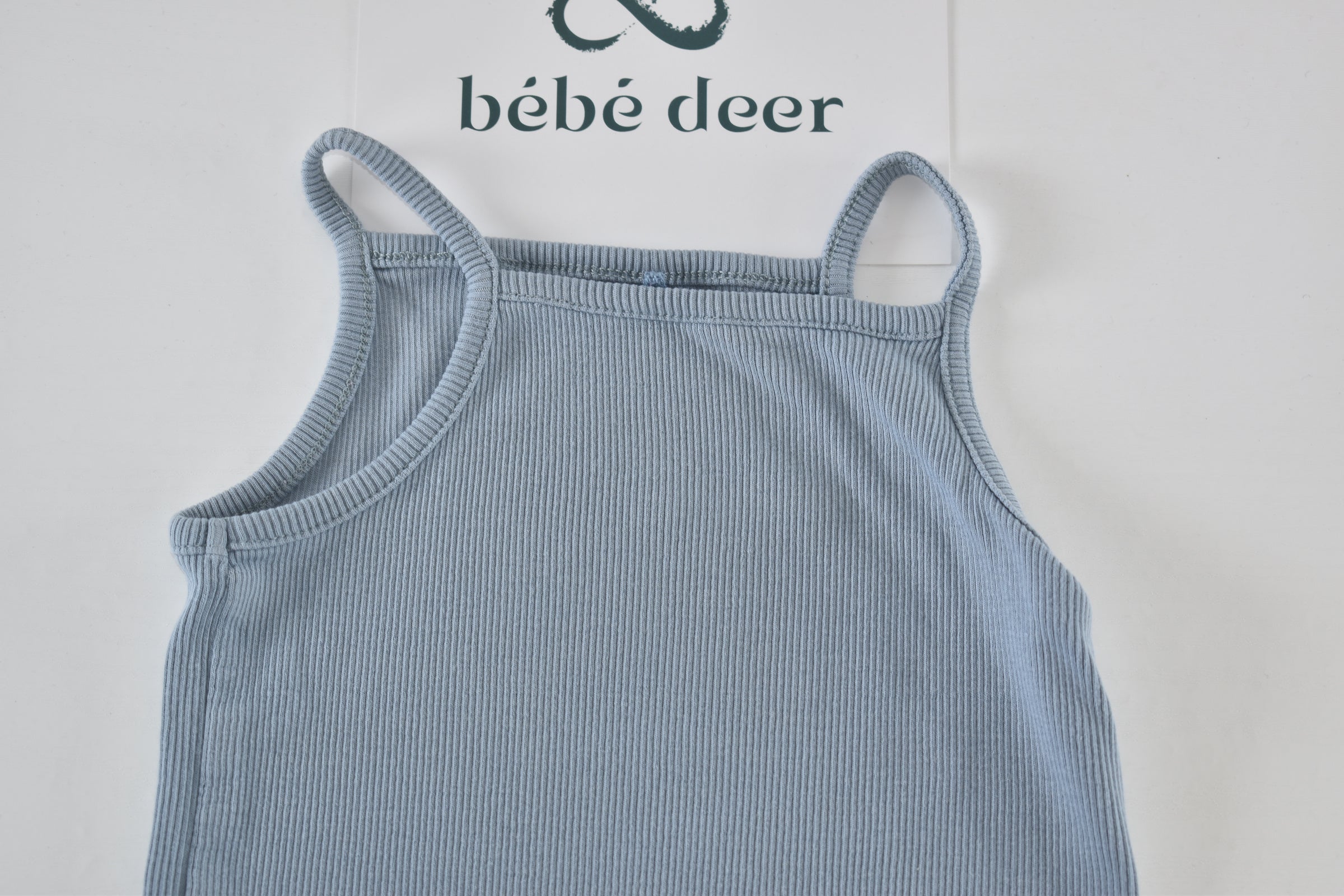 Light blue ribbed bodysuit