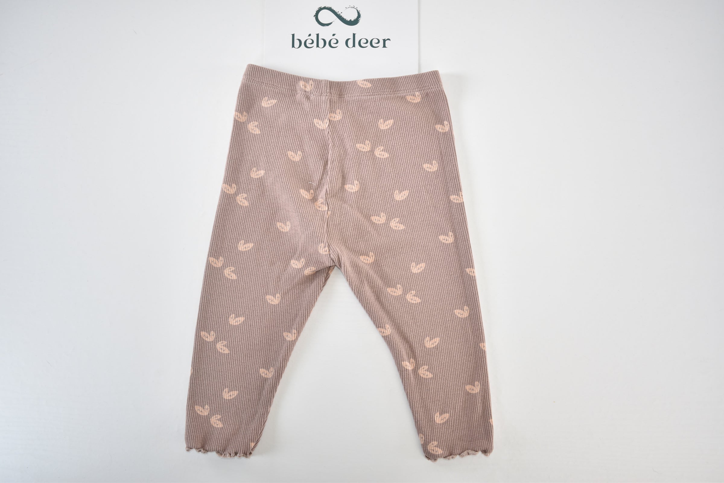 Taupe ribbed leggings with leaf print