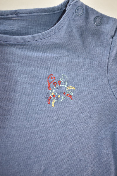 Blue top with crab