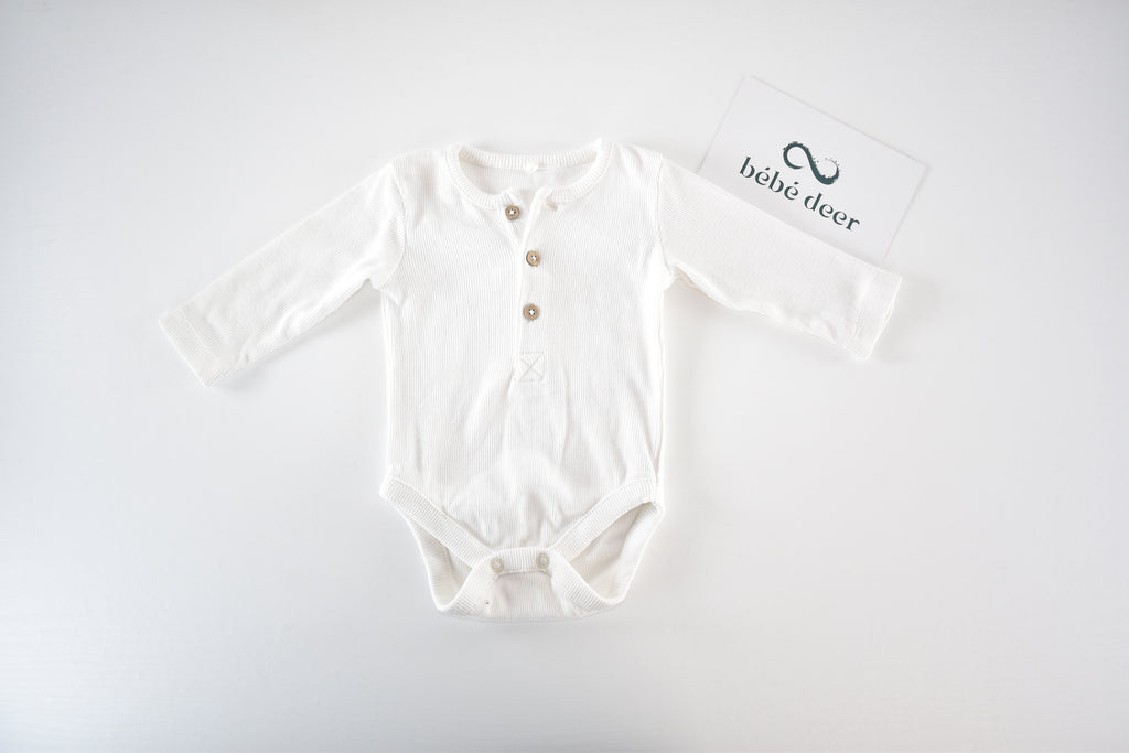 White ribbed long sleeve bodysuit