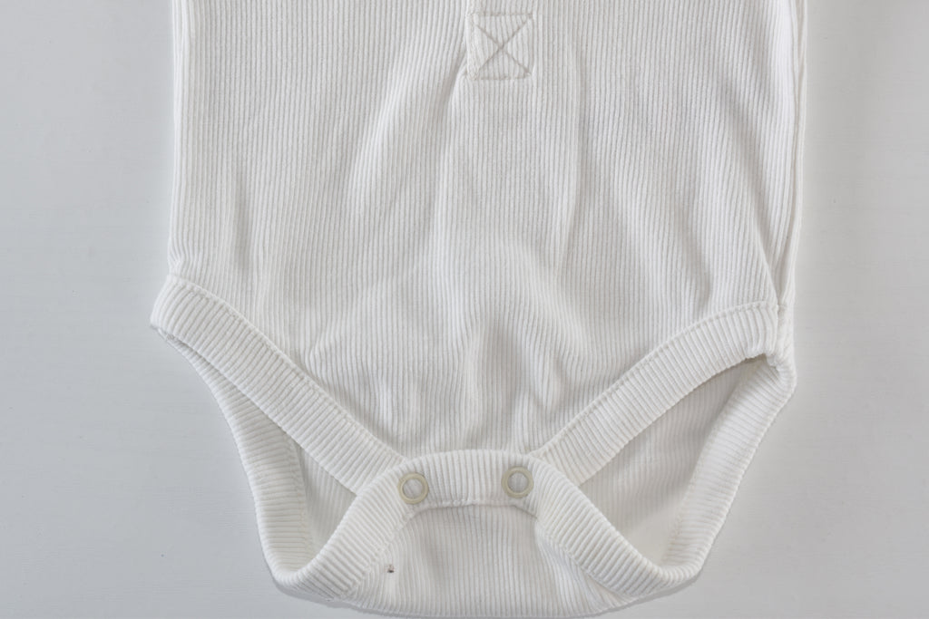 White ribbed long sleeve bodysuit