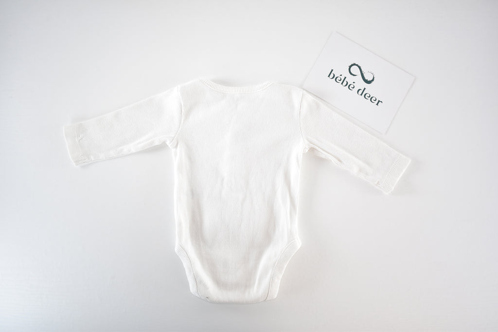 White ribbed long sleeve bodysuit