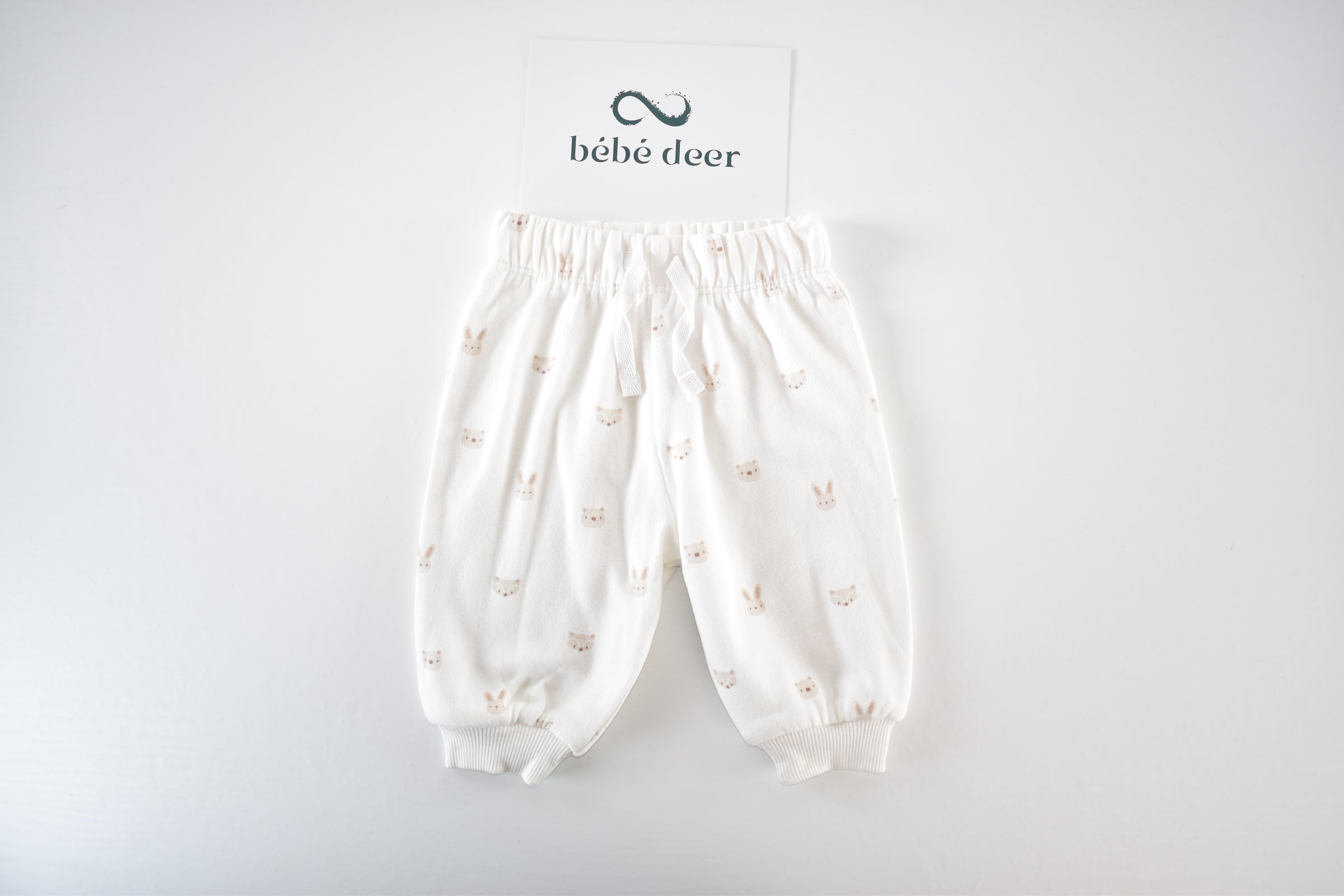 Cream Woodland Print trousers