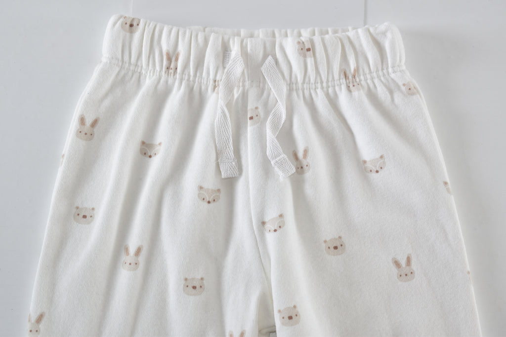 Cream Woodland Print trousers