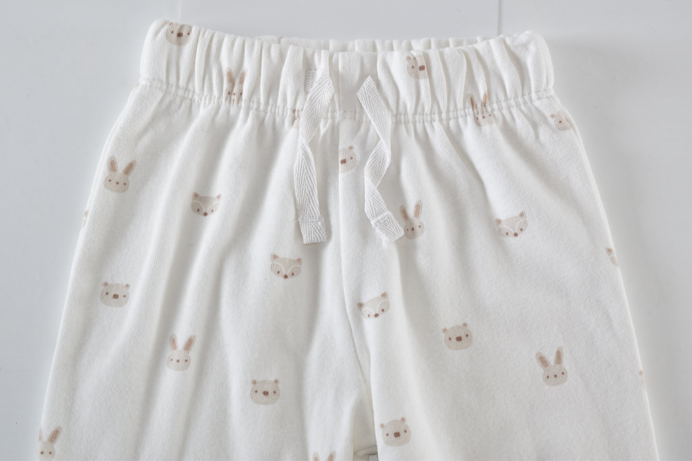 Cream Woodland Print trousers