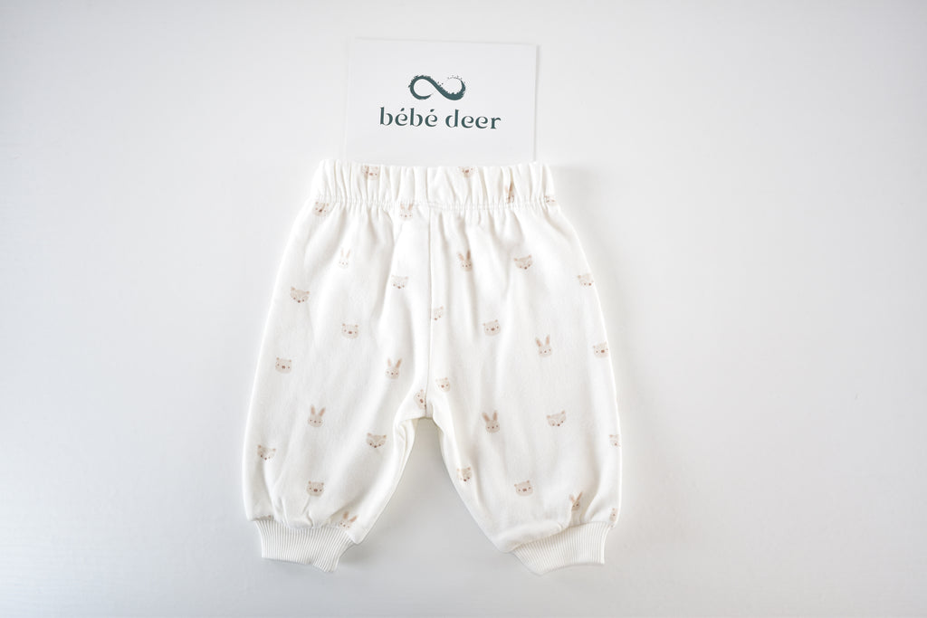 Cream Woodland Print trousers