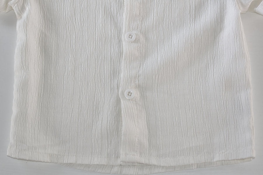 Chemise blanche à manches courtes avec dinosaure brodé