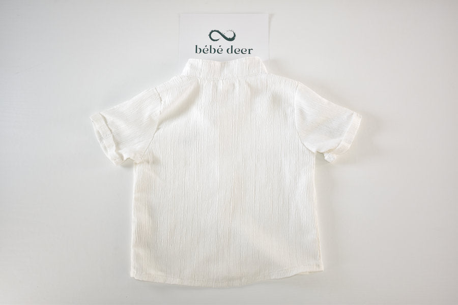 Chemise blanche à manches courtes avec dinosaure brodé