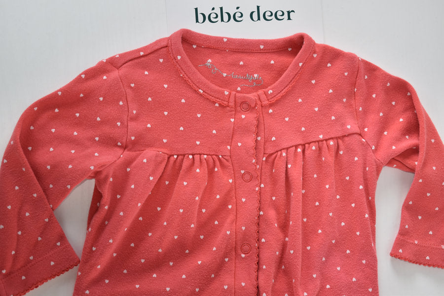 Red polka dot sleepsuit with frill detail