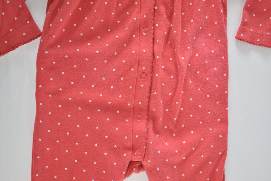Red polka dot sleepsuit with frill detail