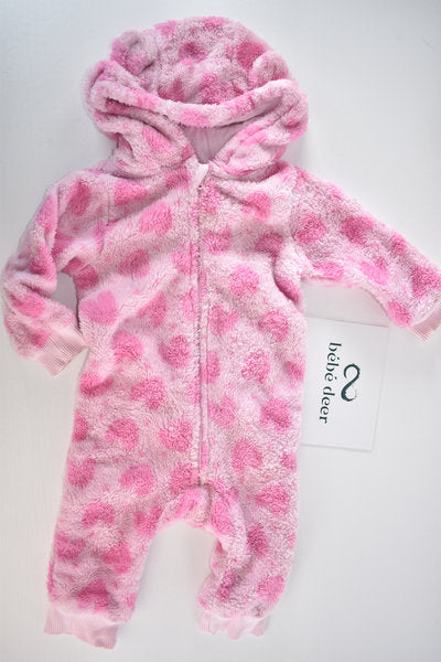 Pink fleece pramsuit with heart pattern