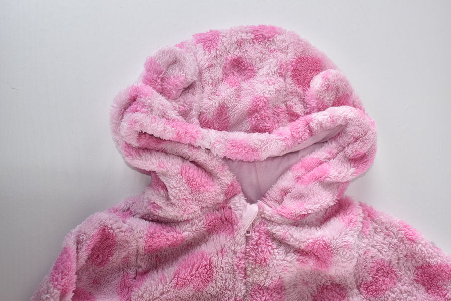 Pink fleece pramsuit with heart pattern