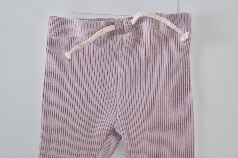 Pink ribbed leggings with drawstring detail