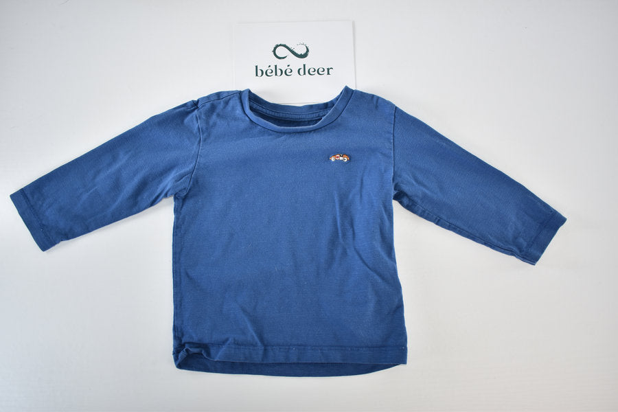Blue long-sleeved top with embroidered car