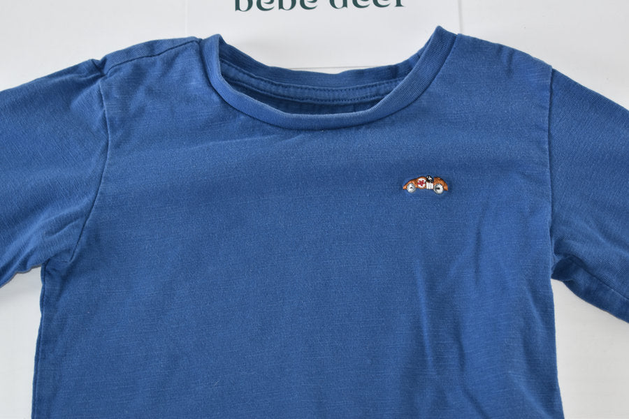 Blue long-sleeved top with embroidered car