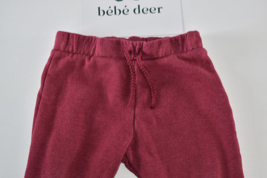 Burgundy trousers with drawstring detail