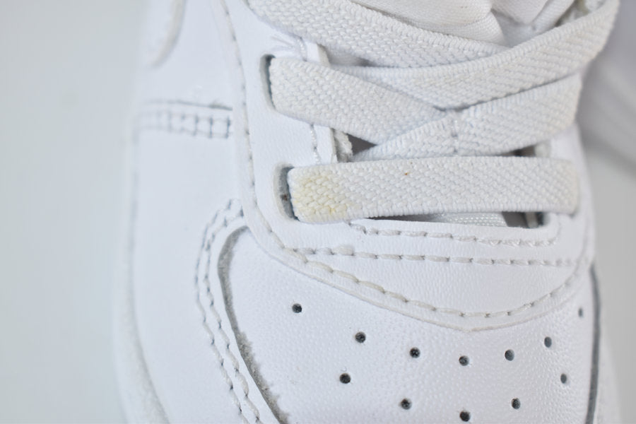 White Nike pre-walker shoes