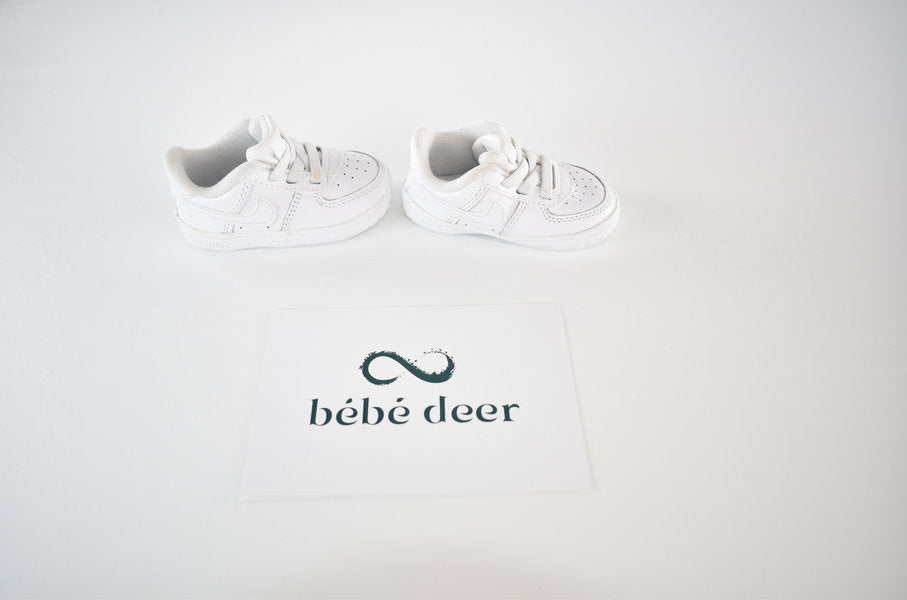 White Nike pre-walker shoes