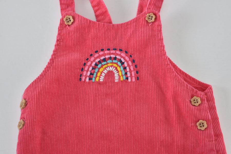 Pink cord pinafore dress with rainbow
