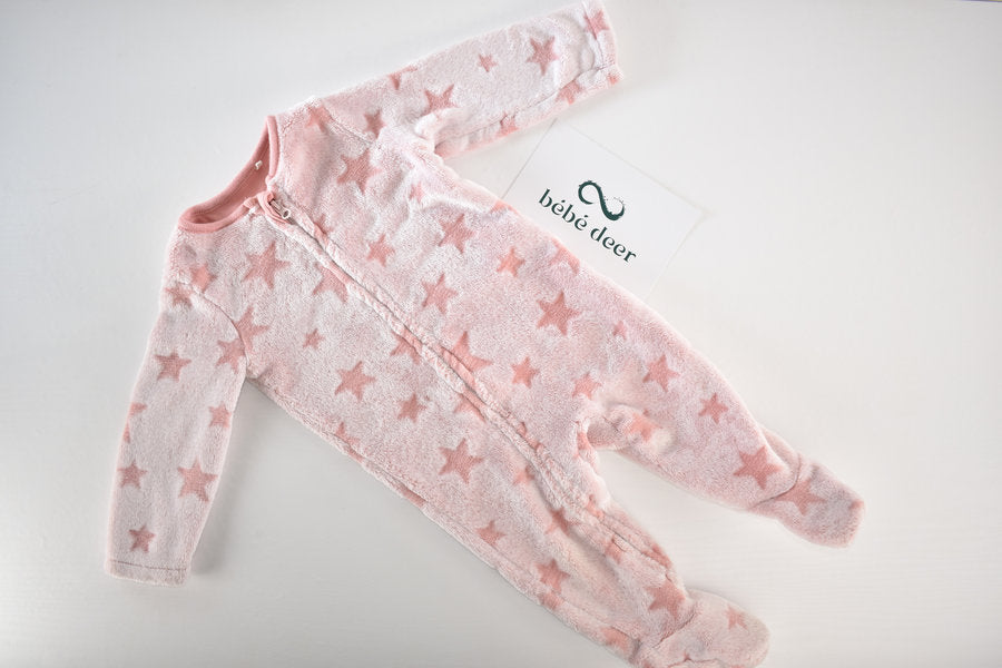 Pink fleece sleepsuit star pattern