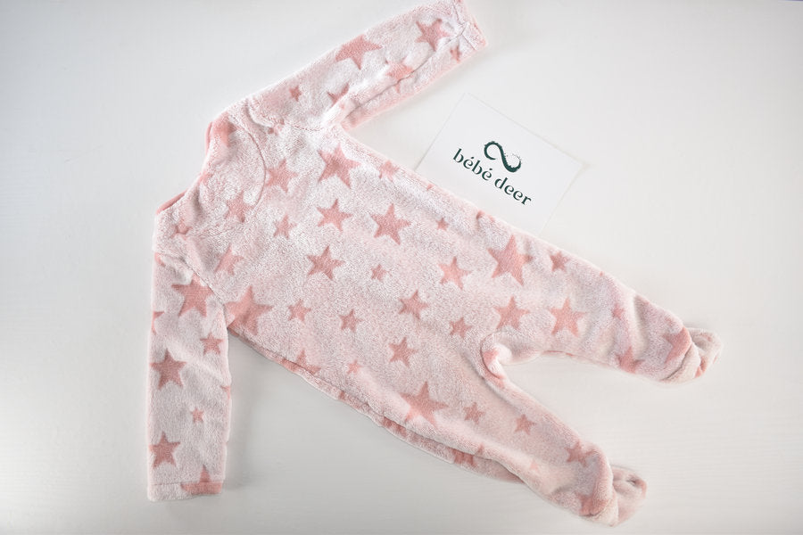 Pink fleece sleepsuit star pattern