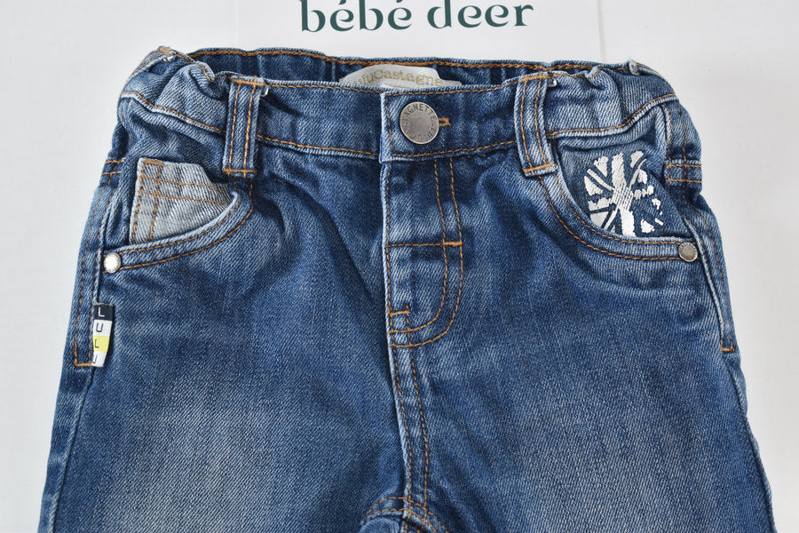 Blue denim trousers with pocket details