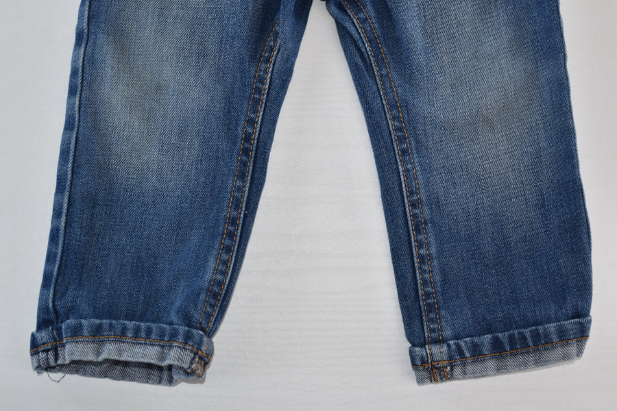 Blue denim trousers with pocket details