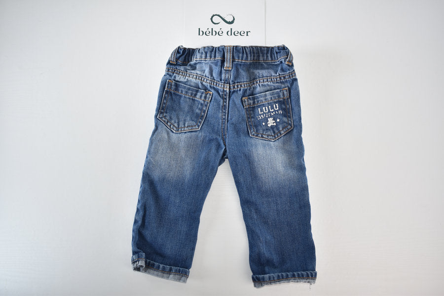 Blue denim trousers with pocket details