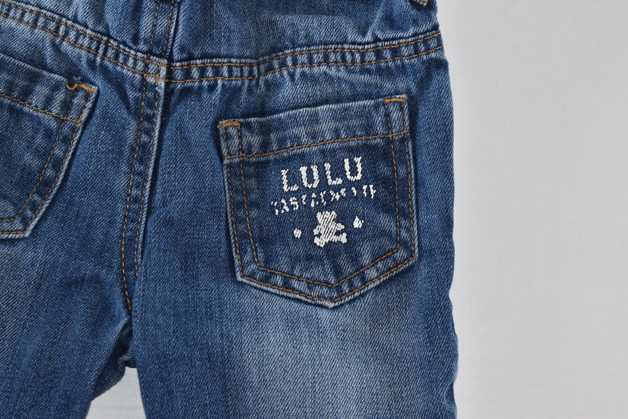 Blue denim trousers with pocket details