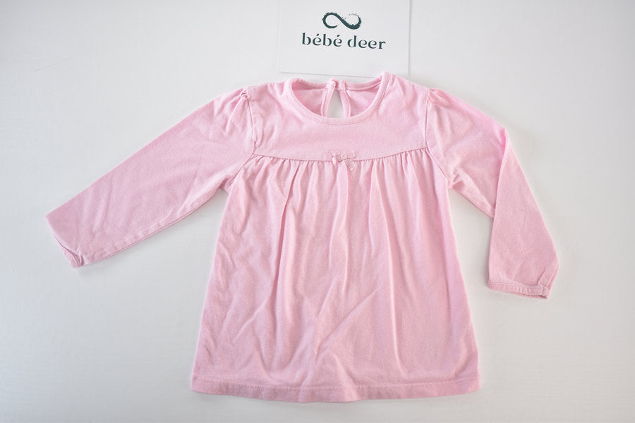 Pink long-sleeved top with bow detail
