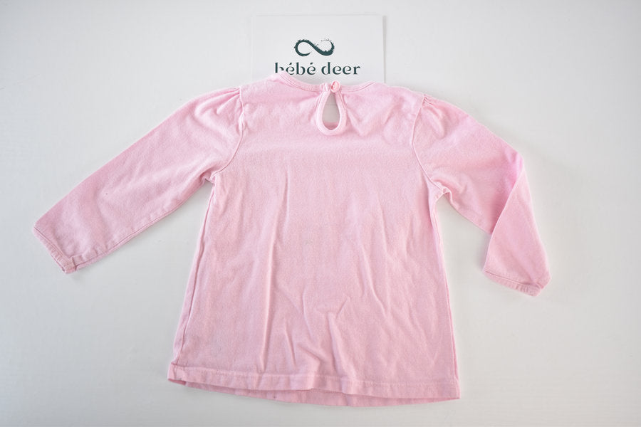 Pink long-sleeved top with bow detail