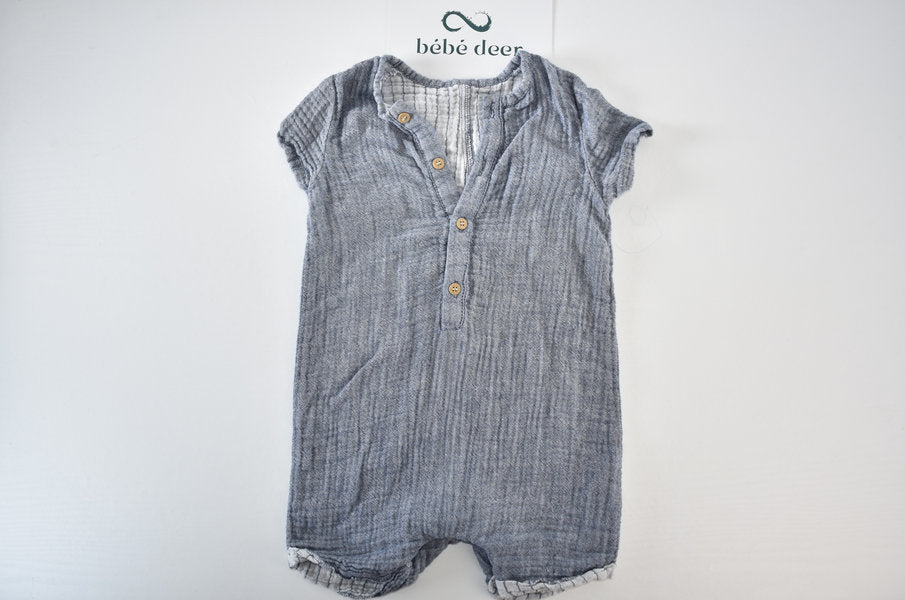 Blue muslin romper with button detail