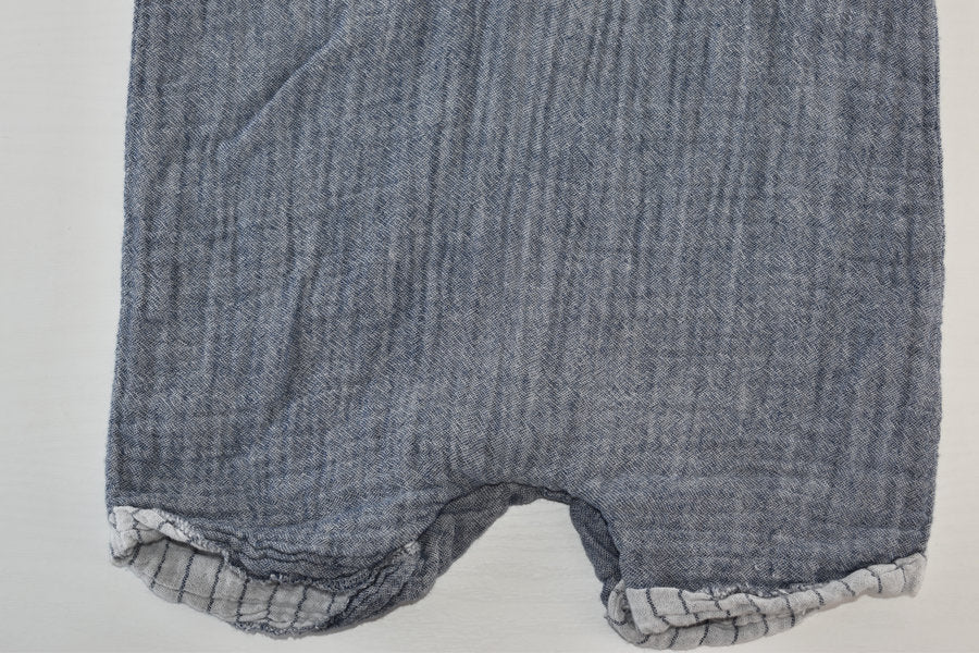 Blue muslin romper with button detail