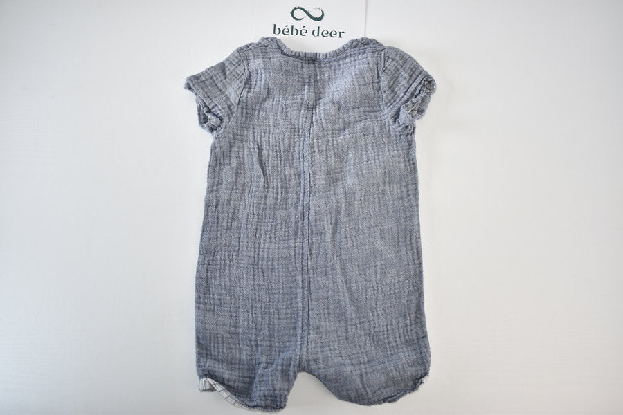 Blue muslin romper with button detail