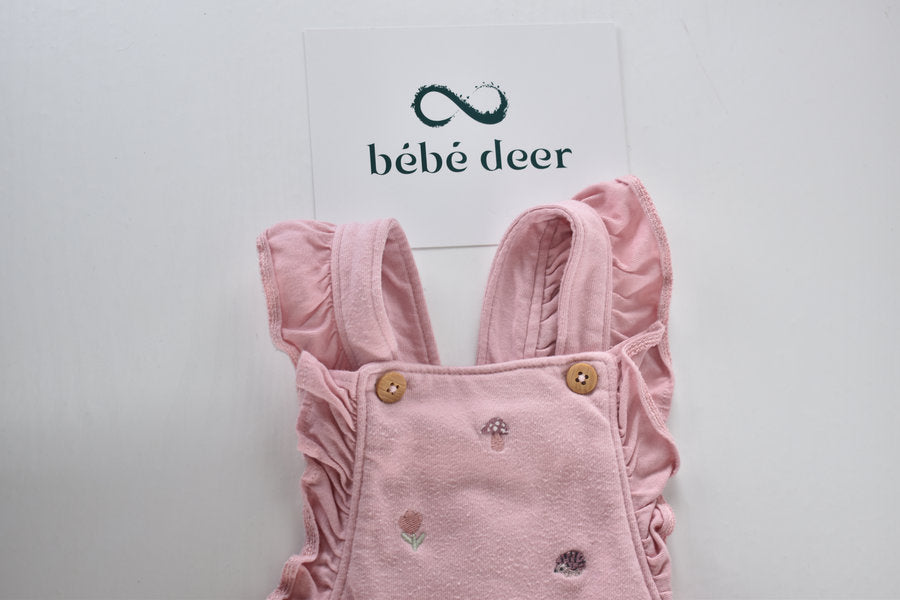Pink embroidered dungarees with frill straps