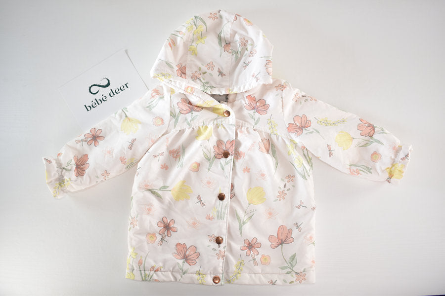 Raincoat with a pastel floral print
